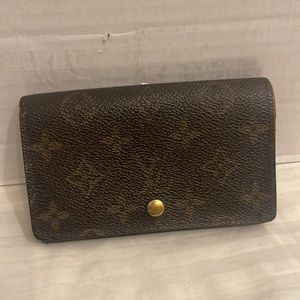 Monogram wallet with minor wear inside good condition outside